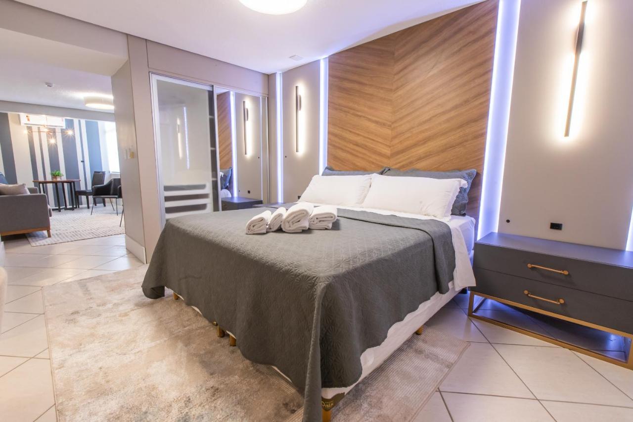 Delupo Hotel - Livin Studios Criciuma  Bagian luar foto