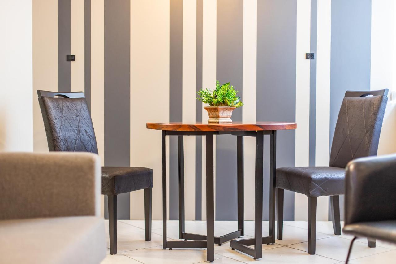 Delupo Hotel - Livin Studios Criciuma  Bagian luar foto